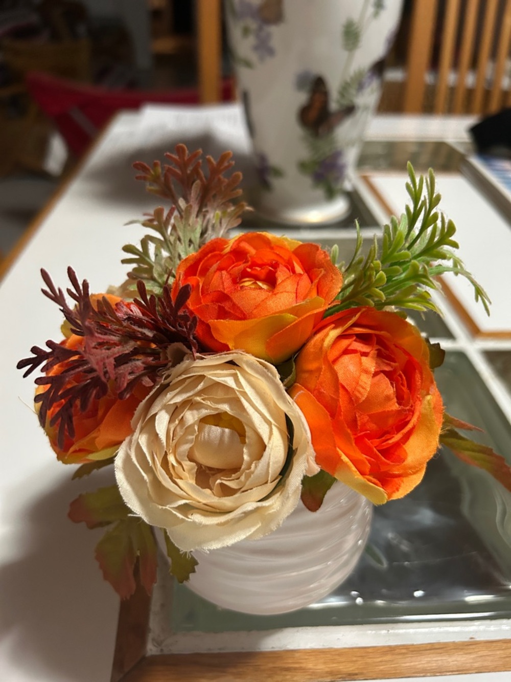 Artificial Orange and Cream floral Arrangement in White Vase